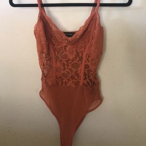 Orange lace bodysuit